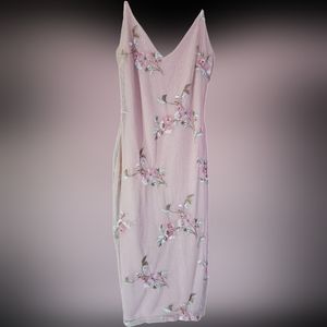 Bodycon pink floral dress with black straps